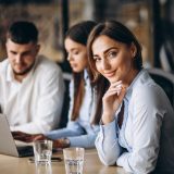 Group of people working out business plan in an office